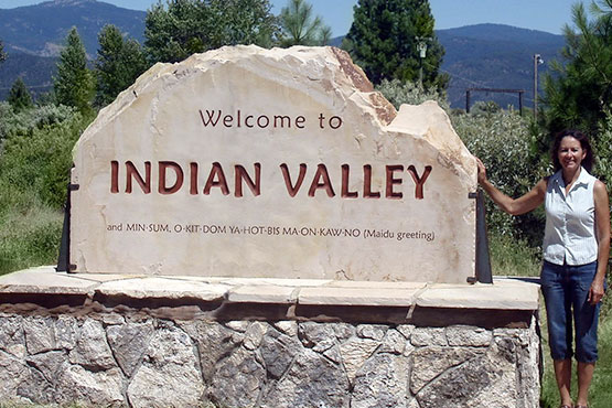 Large engraved sandstone entry sign for Indian Valley