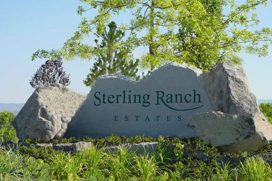 Large polished stone sign for HOA Sterling Ranch